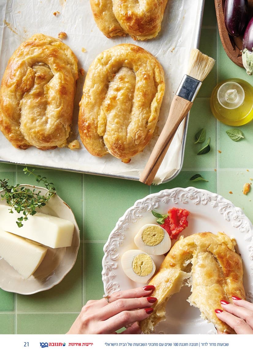 A spread with a tart cut open beside its recipe